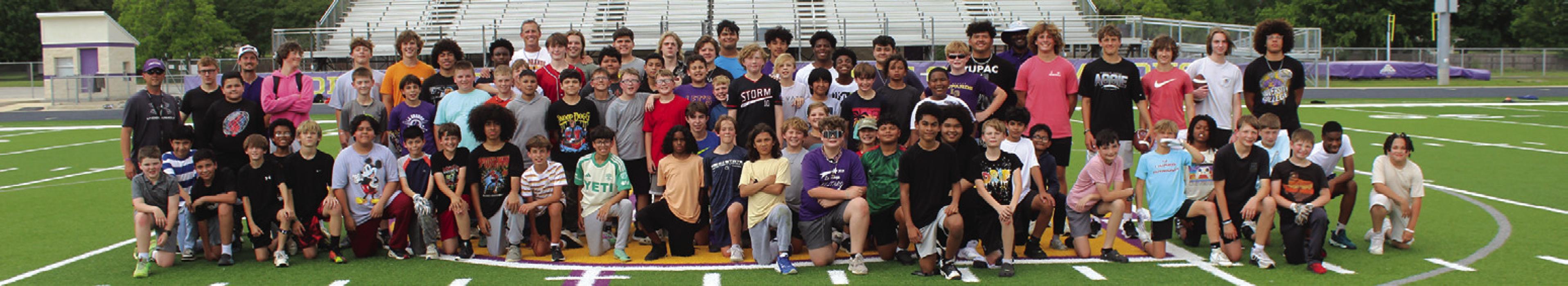 Last week an after-school 7-on-7 football league for 5th and 6th graders, coached by current Leopard high school football players, began at Leopard Stadium. Here are the campers during a break in the action. The camp concludes this week. Photo by Jeff Wick